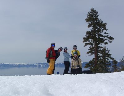 John, Matthew, Kim, Morris, and Monica (front) posing at...