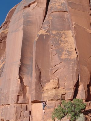Monica climbing an unnamed 5.10 next to Tube Steaks Tomorrow.