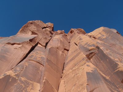 Looking up at several hundred feet of Wingate sandstone.