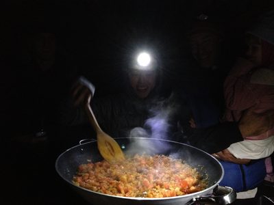 Jen cooking paella. All in all the Thanksgiving feast...