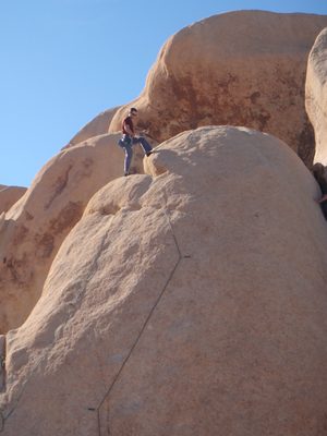 Jay rigging up a rappel.