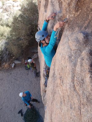 Monica working on a nut placement while Lee is belaying.