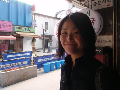 Monica, outside a spice store on the main pedestrian...