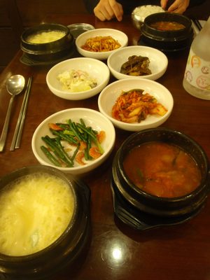 Our $5 breakfast: omelet, soup with seafood, green...