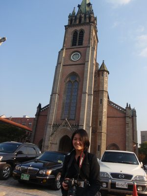 Monica in front of the Catholic cathedral in Seoul.