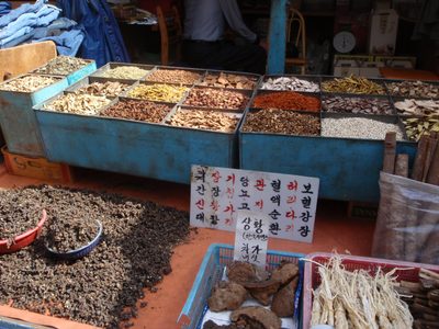 Spices and such. At far right are cinnamon sticks,...