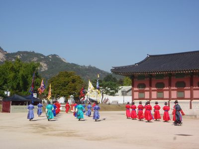 The procession leaving the front of the palace.
