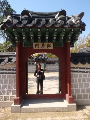 Monica posing in some gateway or another.