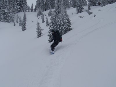 Yang snowboarding.