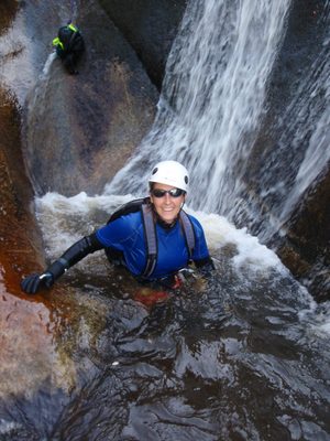 Catherine at the bottom of the last rappel.