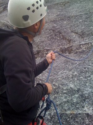 John feeding out the last foot of slack for Monica on...