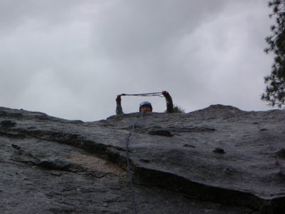 Monica, having climbed a 5.6 in the rain on Dental Wall...