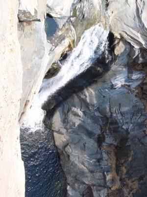 The waterfall right above the first rappel.