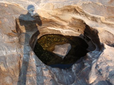 A little pot hole, with my reflection.