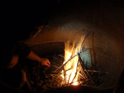 Making a fire in a pot hole.