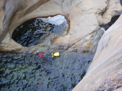 Getting out of the water on slippery water-polished rock...