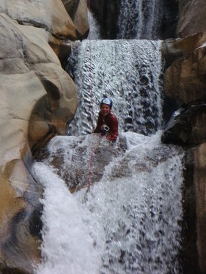 Joel having fun in the waterfall.