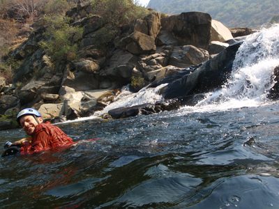 Joel floating down river.