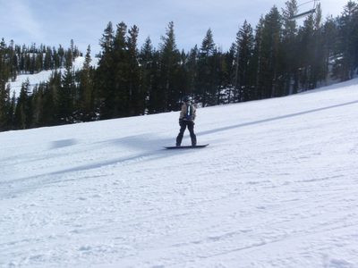 Monica skiing back to the lodge at the end of the day. ...