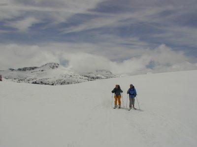Catherine and Rachel on the saddle descending into the...