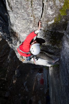 Finding a constriction in the rock to get a wrist in.