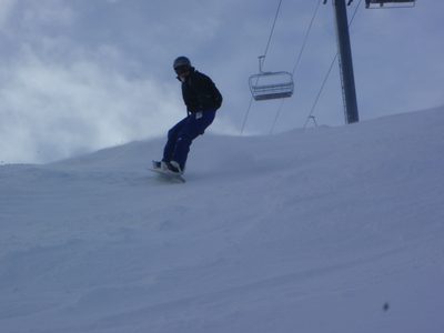 Catherine ripping it up under Lone Tree lift at Moonlight Basin.