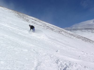 Catherine on Lone Mountain, skiing some fresh tracks.