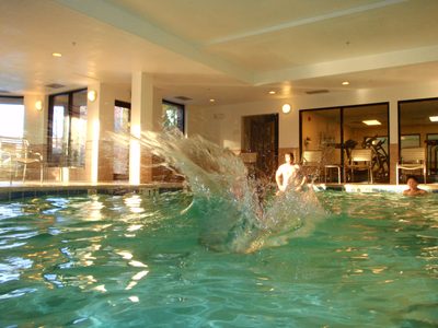 John jumping into the pool.