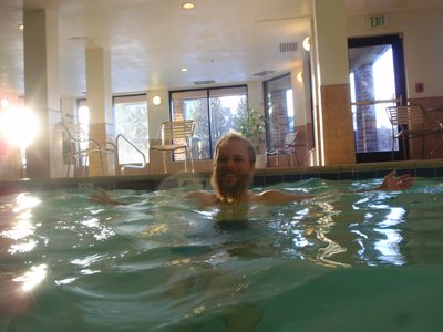 John, splashing in the pool. 