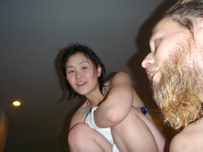 Monica, getting out of the hot tub.