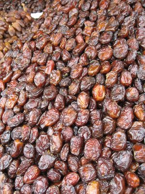 Figs, covered with flies.