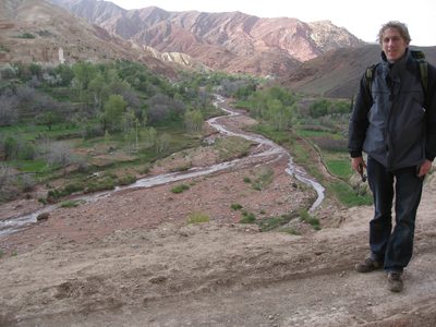 Trevor with our guide's village in the background.