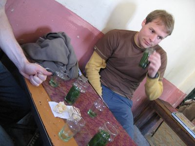 John drinking "Berber whiskey".