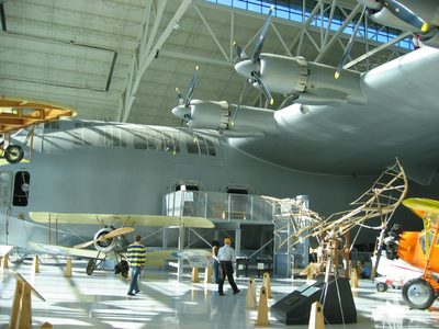Dad (yellow hat) in front of the Spruce Goose in...