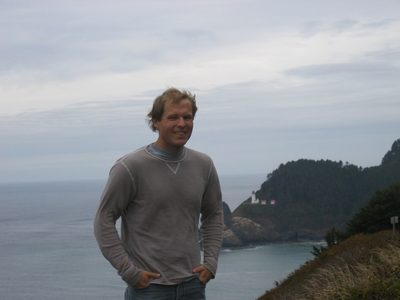 John in front of the Heceta Head Lighthouse.