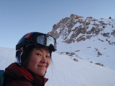 Some sun rays still catching the mountain behind Monica's head.