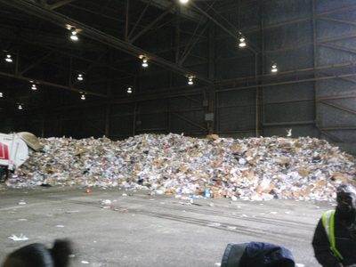 Piles of recyclables waiting to be sorted at Pier 96.