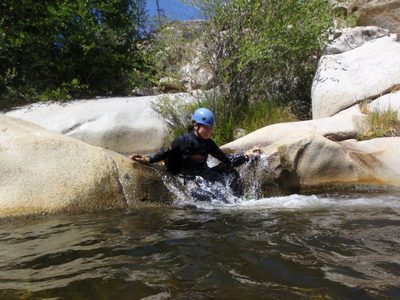 Monica water sliding between two pools.