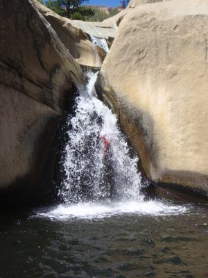 John, inside the waterfall.