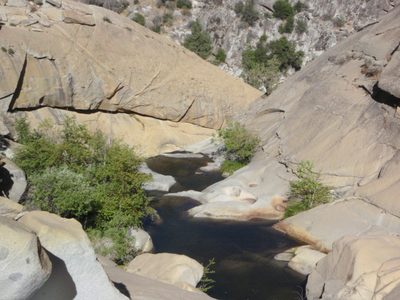 The canyon ahead.  The wall in the background (with...