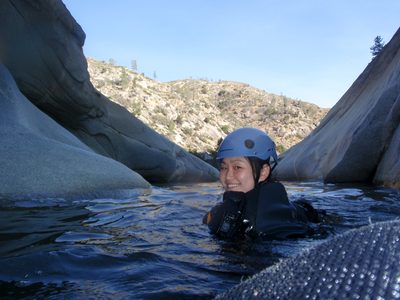 Monica swimming out through the last of the passageways...