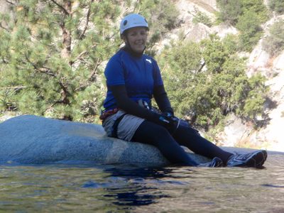 Catherine, sitting on the final lip before the Kern River.