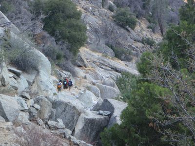 The team hikes out along the well-maintained NFS trail...
