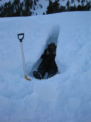 Niels, having just dug his own grave, gives a sign of approval.