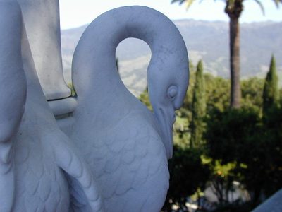 A carved goose or crane on a post at Hearst Castle.