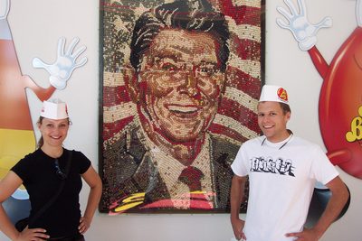 Tini and John and the portrait of the 40th President of...