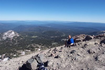 John enjoying the view east from the top of Lassen Peak.