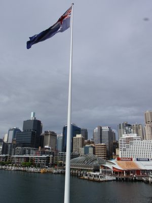 An Australian flag, flying over Darling Harbour.