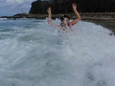 Monica frolicking in the surf at Bondi Beach. 