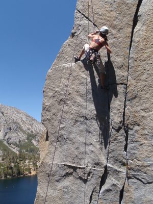 Using a heel hook to get up on the ledge.
